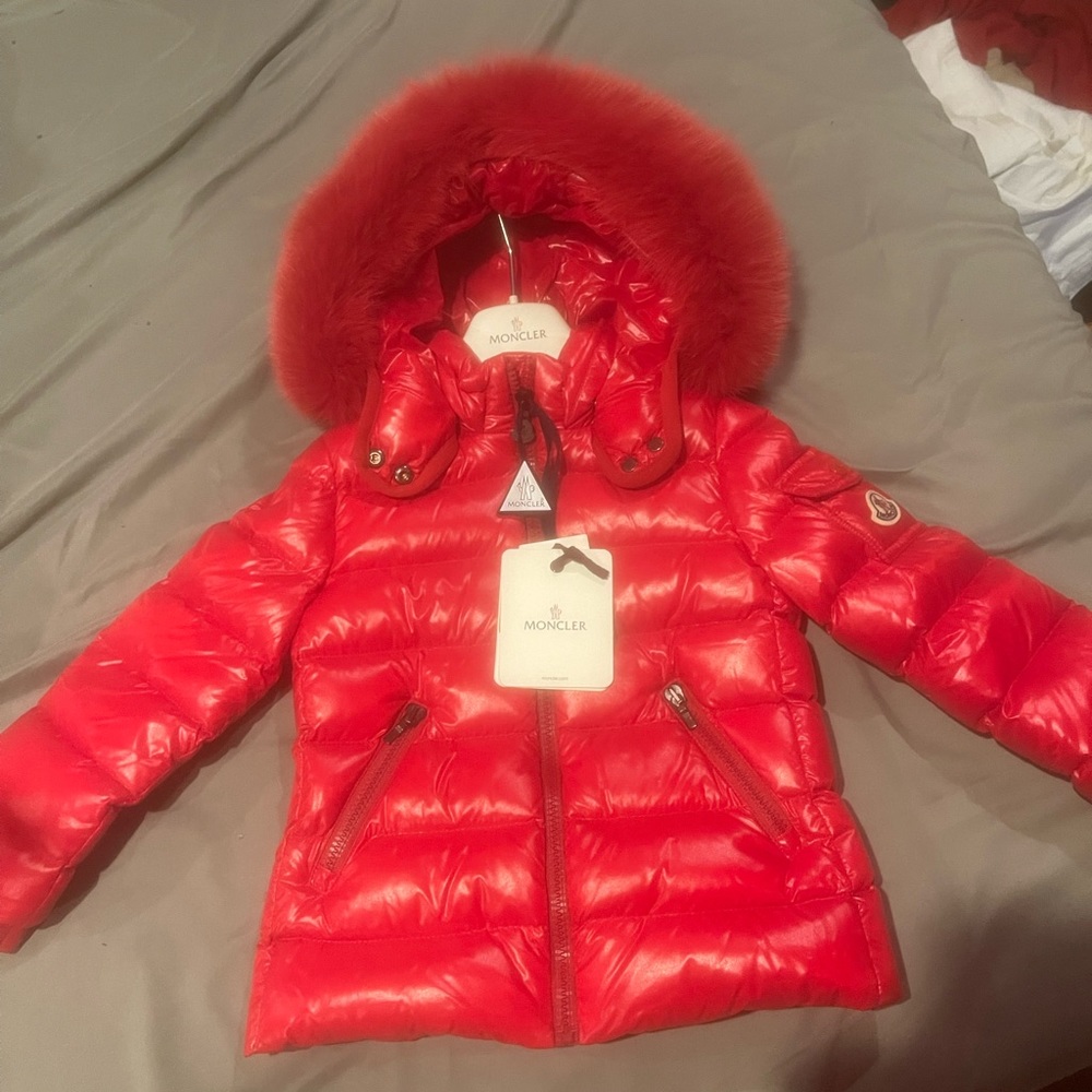 Brand new girls moncler size 4A.
